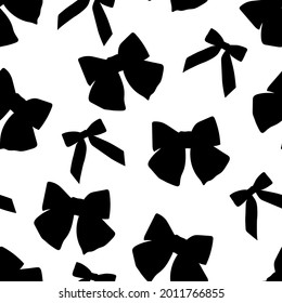 Seamless pattern black bows silhouettes vector illustration