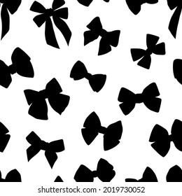 Seamless pattern black bows silhouettes vector illustration