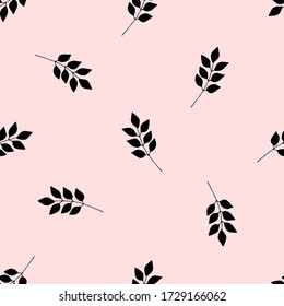 Seamless pattern with a black branch silhouette on a soft pink background. Vector