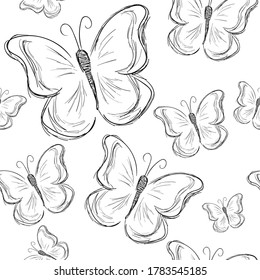 Patrón sin foco con mariposas negras sobre un fondo blanco. Dibujo a mano libre.
