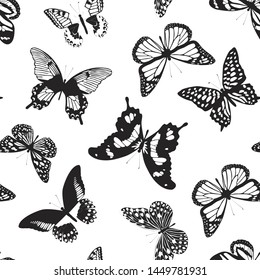 Seamless pattern. Black butterflies. White background.