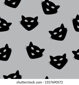 Seamless Pattern of black cat heads on grey background. Vector illustration. Animal silhouette. Wallpaper and fabric design and decor.