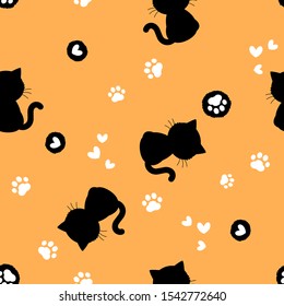 Seamless pattern with Black cat kitten and footprint on orange background. cute cartoon character vector illustration.