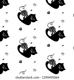 Seamless pattern black cat playing with yarn ball black and white vector design