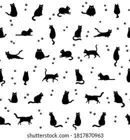 Seamless pattern with black cats