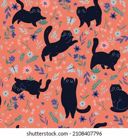 Seamless pattern with black cats and flowers. Vector graphics.
