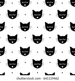 Seamless pattern with black cats. Vector, eps10. Fabric print.Repeating wallpaper. Textile design. Meow and cat head. Cute background with cats.