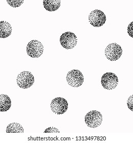 Seamless pattern with black circles drawn with dots