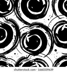 Seamless pattern with black circles on white background. Minimalistic design for paper, textile, packaging, background, wallpaper. Vector. 