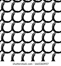Seamless pattern with black circles on a white background.  Isolated geometric. Great for fabric, wallpaper, textile, wrapping. Vector background.