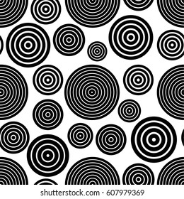 Seamless pattern with black circles on a white background. Vector EPS 10