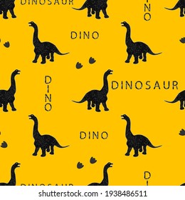 Seamless pattern with black dinosaurs, text and footprints