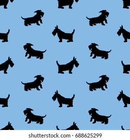 Seamless pattern with black dogs silhouettes, scotchterrier on blue background. Childish Animal design for boys.