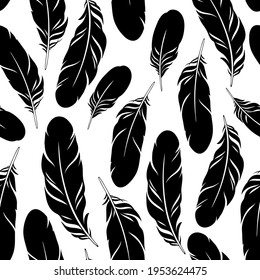seamless pattern with black feathers silhouettes