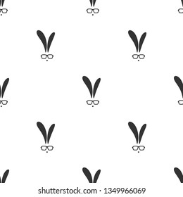 Seamless pattern with black flat hipster rabbit silhouette with glasses. Decorative funny ornament, good for printing. Vector print with bunny. Flat design