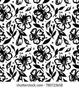 Seamless pattern of black flowers drawn in ink.
