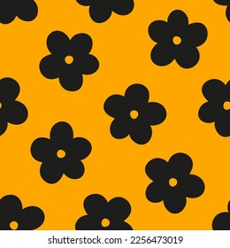 Patrón sin foco con flores negras y fondo naranja