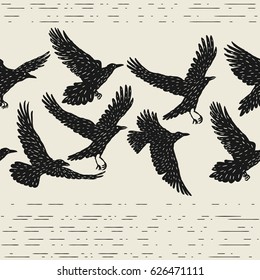 Seamless pattern with black flying ravens. Hand drawn inky birds.