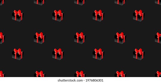 Seamless pattern of black gift boxes with red bows. Suitable for wrapping paper, fabric, festive background.   Vector background.