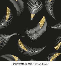 Seamless pattern with black gold feathers of bird. Repeating texture. Boho style.
