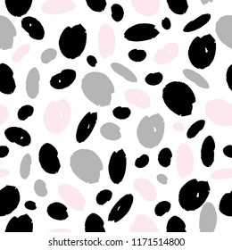 Seamless pattern with black, gray and pink specks on a white background. Vector abstract background. Scandinavian style. Printing on fabric, clothing, cases, packaging, paper, wallpaper.