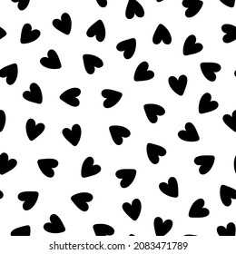 Seamless pattern with black hearts