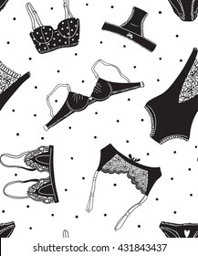 Seamless pattern of black icons of women's underwear on a white background with dots, hand-drawn design. Vector illustration