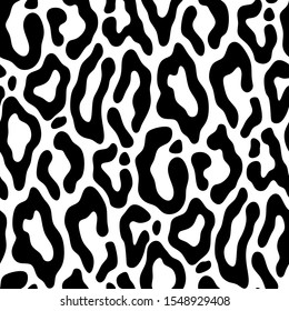 Seamless pattern of black leopard, cheetah spots, animal skin