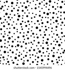 Seamless pattern. Black on a white background, circles and dots of different sizes.