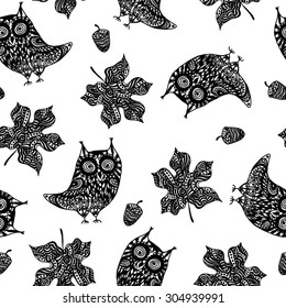 seamless pattern with black owls and maple leaves