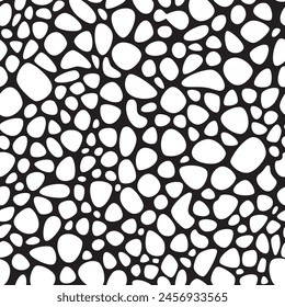 Seamless pattern of black pebbles arranged in a random organic pattern on a white background