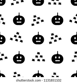 Seamless pattern with black pumpkins and triangles on the white background. Vector illustration