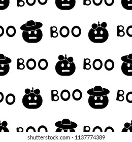 Seamless pattern with black pumpkins, words Boo on the white background. Vector illustration