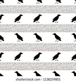 Seamless pattern with black ravens on the white background . Vector illustration