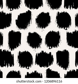 Seamless pattern with black round wide brush strokes on cream background. Monochrome hand drawn ink texture. Minimal abstract design.