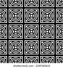 
Seamless pattern of black shapes on white background.