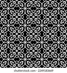 Seamless pattern of black shapes on white background.