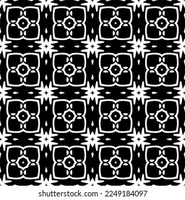 
Seamless pattern of black shapes on white background.