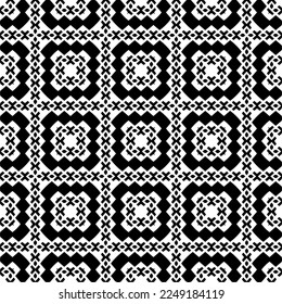
Seamless pattern of black shapes on white background.