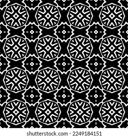 Seamless pattern of black shapes on white background.