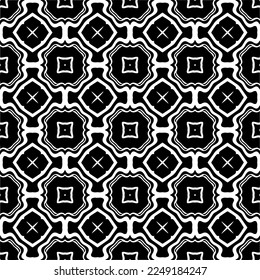
Seamless pattern of black shapes on white background.