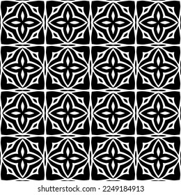 Seamless pattern of black shapes on white background.