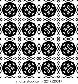 Seamless pattern of black shapes on white background.