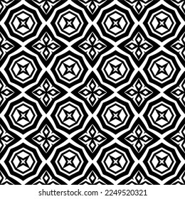 Seamless pattern of black shapes on white background.