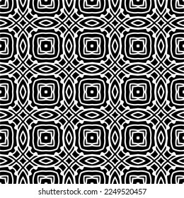 Seamless pattern of black shapes on white background.