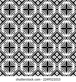 Seamless pattern of black shapes on white background.