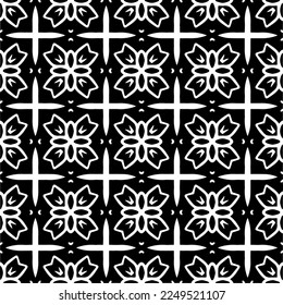 Seamless pattern of black shapes on white background.