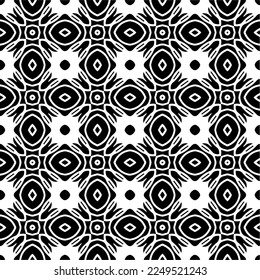 Seamless pattern of black shapes on white background.