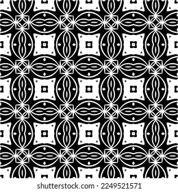 Seamless pattern of black shapes on white background.
