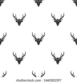 seamless  pattern with black silhouette of deer head with royal crown. vector flat Christmas ornament on white background